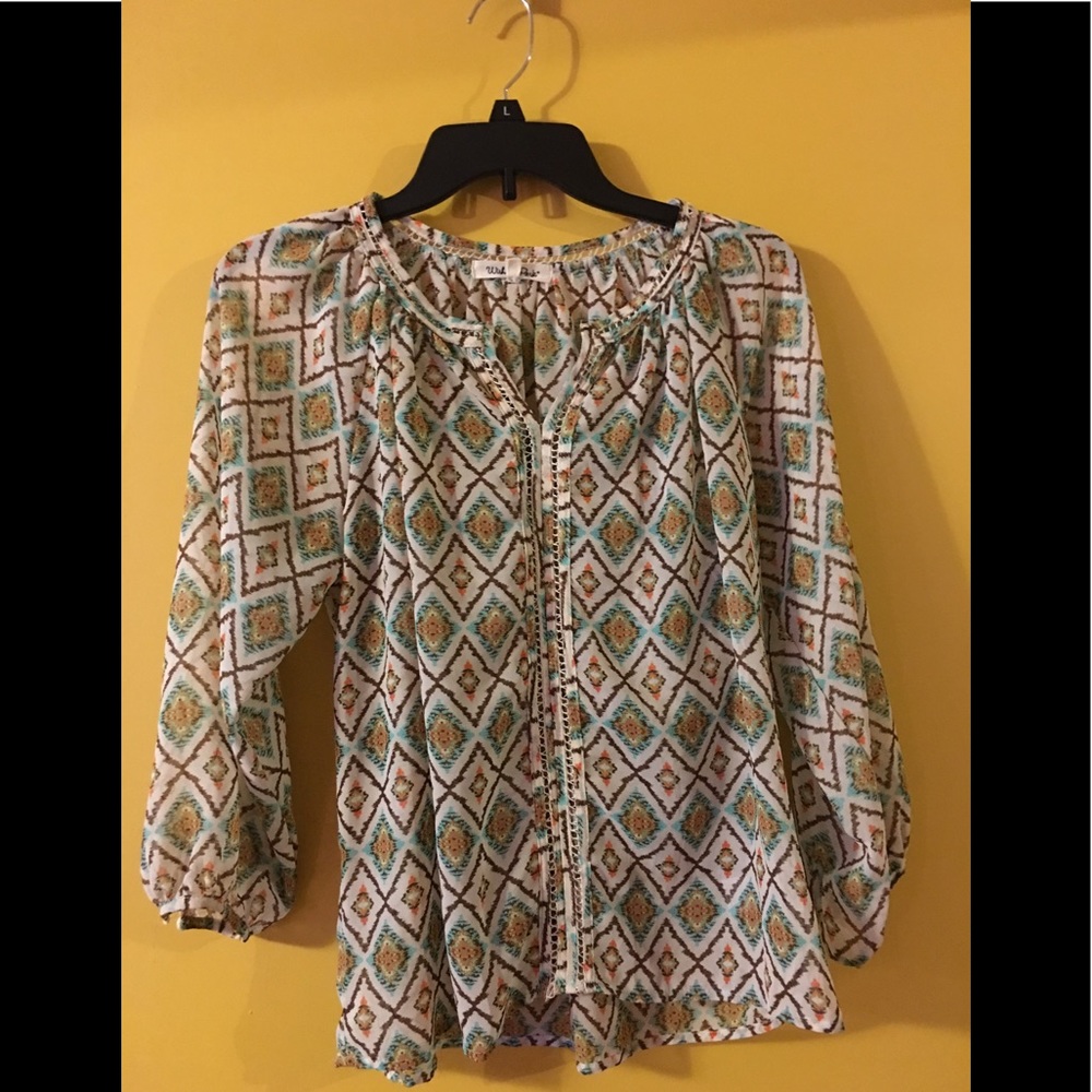 Women’s sheer print cream top size L